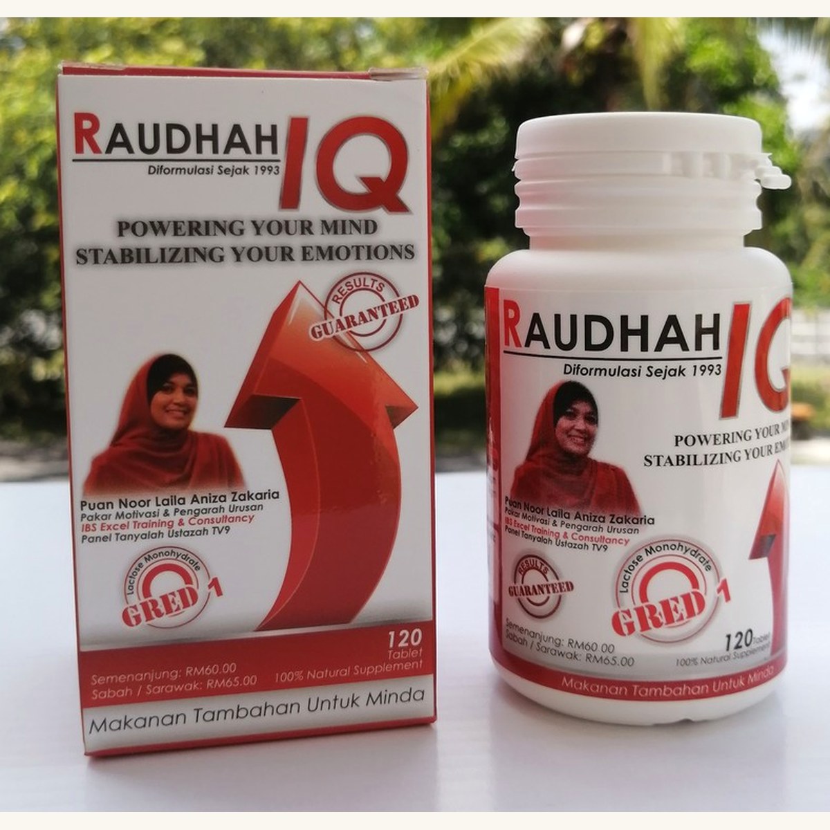 Kotak dan botol Raudhah IQ di atas meja